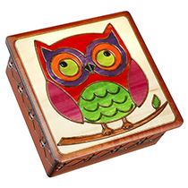 Colorful Owl on a Branch with Leaf