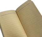 Open notebook, closeup of ruled paged.